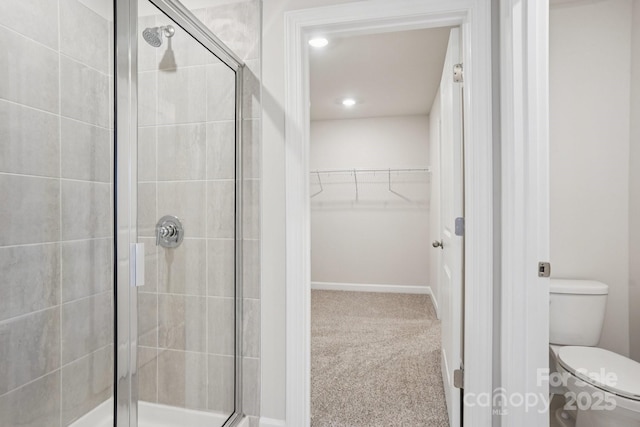 1997 Paddlewheel Dr, Stanley, NC 28164 - bathroom with a shower stall, a spacious closet, and recessed lighting