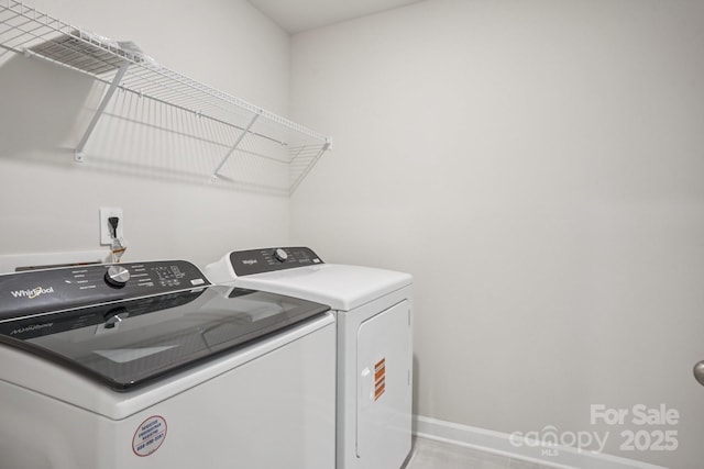 1997 Paddlewheel Dr, Stanley, NC 28164 - washroom with washer and clothes dryer and baseboards
