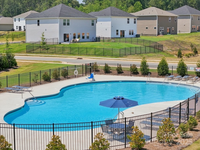 1997 Paddlewheel Dr, Stanley, NC 28164 - community pool featuring a patio area and a residential view