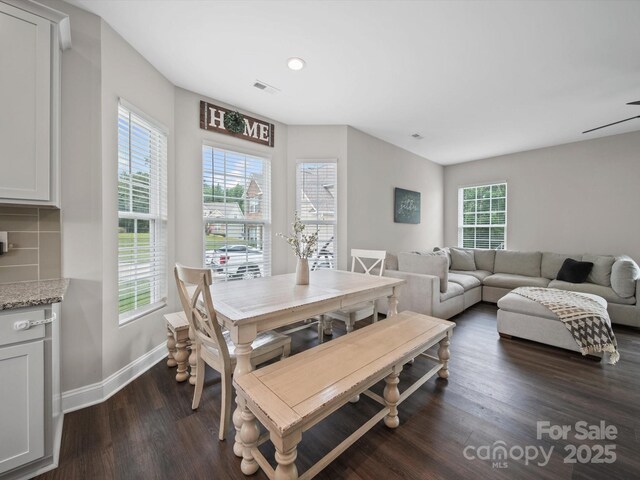 8810 Crape Myrtle Dr, Stanfield, NC 28163 - dining space with dark wood finished floors and recessed lighting
