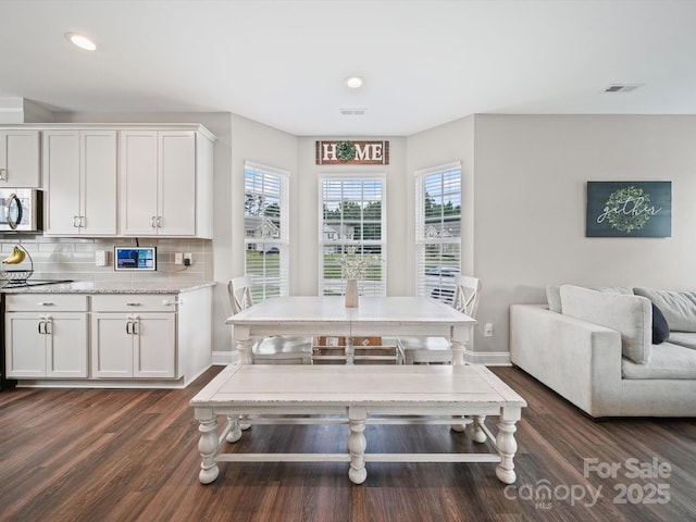 8810 Crape Myrtle Dr, Stanfield, NC 28163 - dining room with dark wood-style floors and recessed lighting