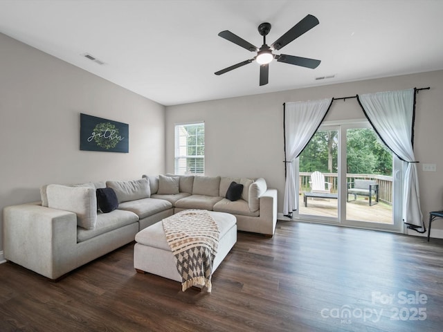 8810 Crape Myrtle Dr, Stanfield, NC 28163 - living area with dark wood-style floors and ceiling fan