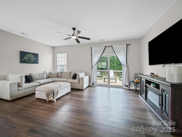8810 Crape Myrtle Dr, Stanfield, NC 28163 - living area featuring plenty of natural light, ceiling fan, and wood finished floors