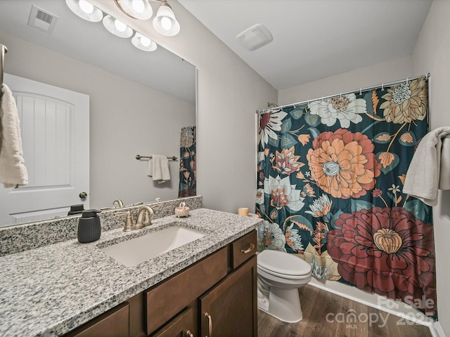 8810 Crape Myrtle Dr, Stanfield, NC 28163 - bathroom featuring vanity, wood finished floors, and a shower with shower curtain