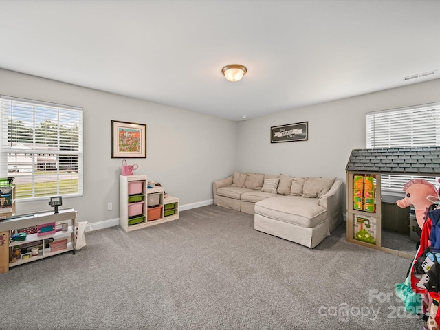 8810 Crape Myrtle Dr, Stanfield, NC 28163 - living room with healthy amount of natural light and carpet