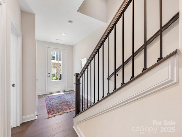 5018 Harrowsmith Ln, Charlotte, NC 28204 - entrance foyer with hardwood / wood-style floors, stairway, and recessed lighting