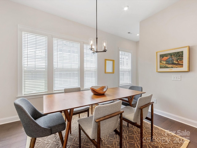 5018 Harrowsmith Ln, Charlotte, NC 28204 - dining area featuring dark wood-style floors, a chandelier, and recessed lighting