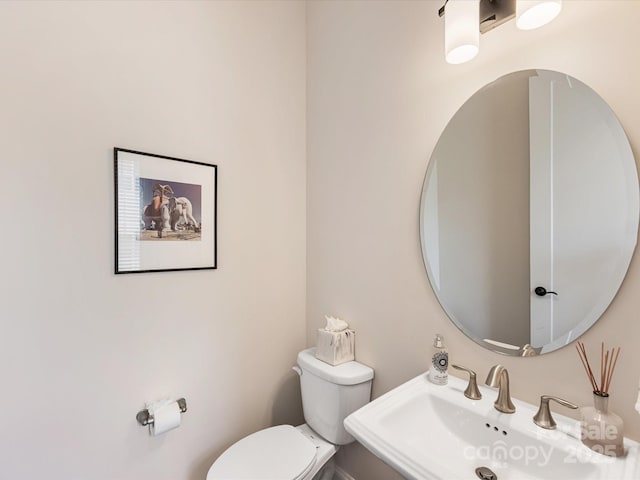 5018 Harrowsmith Ln, Charlotte, NC 28204 - bathroom featuring a sink and toilet