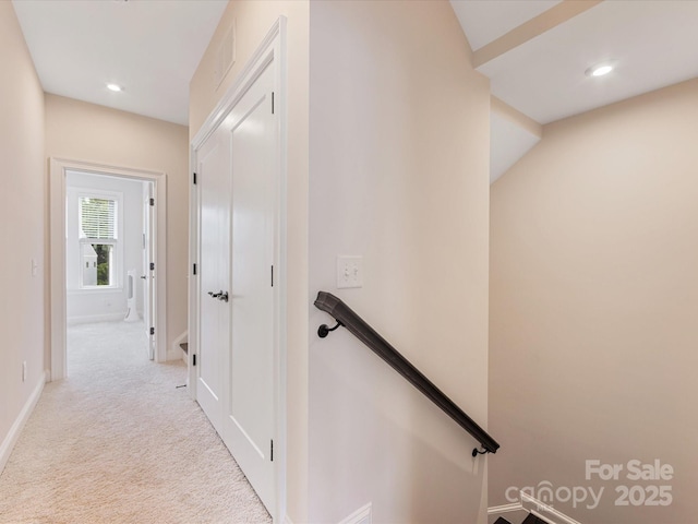 5018 Harrowsmith Ln, Charlotte, NC 28204 - hallway featuring an upstairs landing, carpet, and recessed lighting