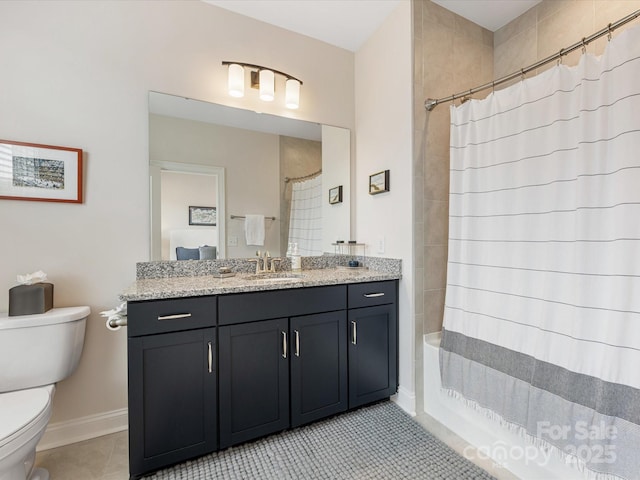 5018 Harrowsmith Ln, Charlotte, NC 28204 - bathroom featuring tile patterned flooring, vanity, and shower / bath combo