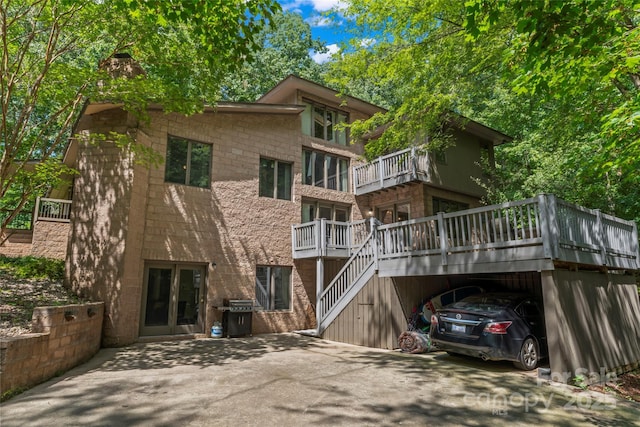 6724 Riverfront Dr, Charlotte, NC 28216 - view of property with driveway and stairs