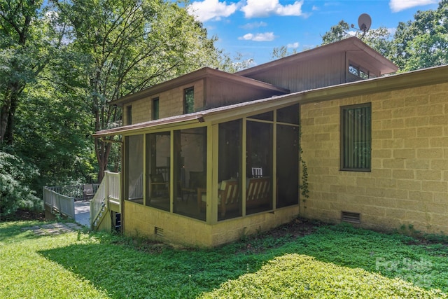 6724 Riverfront Dr, Charlotte, NC 28216 - view of home's exterior with crawl space, a sunroom, and a yard