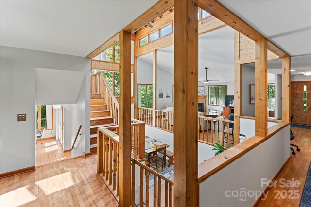 6724 Riverfront Dr, Charlotte, NC 28216 - corridor with hardwood / wood-style flooring and an upstairs landing