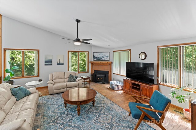 6724 Riverfront Dr, Charlotte, NC 28216 - living area featuring a ceiling fan, vaulted ceiling, and light wood-style flooring