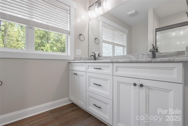 5005 Oconee Dr, Stanley, NC 28164 - full bath featuring double vanity and wood finished floors