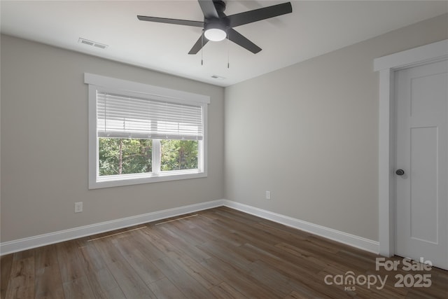 5005 Oconee Dr, Stanley, NC 28164 - spare room with dark wood finished floors and a ceiling fan
