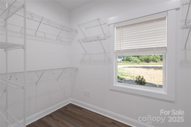 5005 Oconee Dr, Stanley, NC 28164 - spacious closet featuring dark wood-type flooring