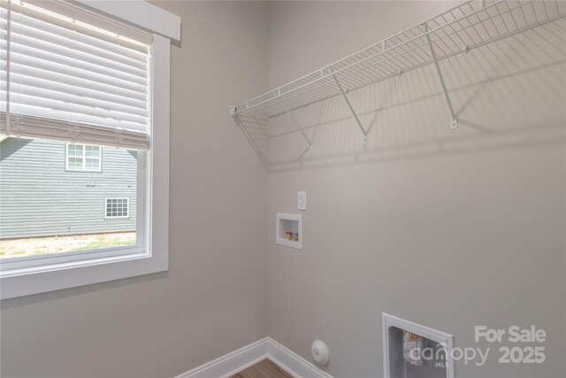 5005 Oconee Dr, Stanley, NC 28164 - washroom featuring washer hookup, hookup for a gas dryer, and wood finished floors