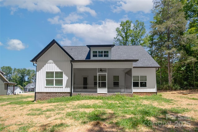 5005 Oconee Dr, Stanley, NC 28164 - rear view of house featuring ceiling fan, a sunroom, roof with shingles, and a lawn