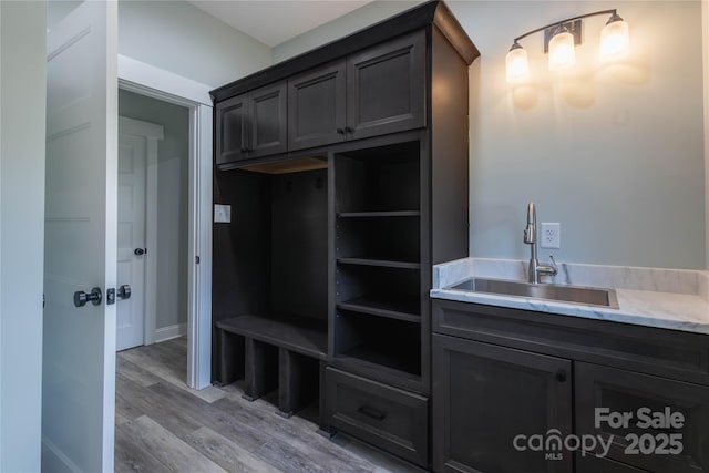 5009 Oconee Dr, Stanley, NC 28164 - mudroom featuring a sink and light wood finished floors