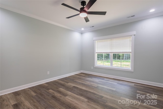 5009 Oconee Dr, Stanley, NC 28164 - spare room with a ceiling fan, crown molding, dark wood finished floors, and recessed lighting