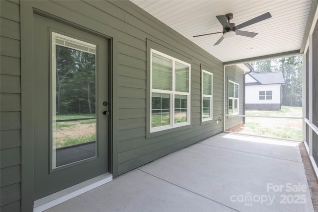 5009 Oconee Dr, Stanley, NC 28164 - unfurnished sunroom with a ceiling fan