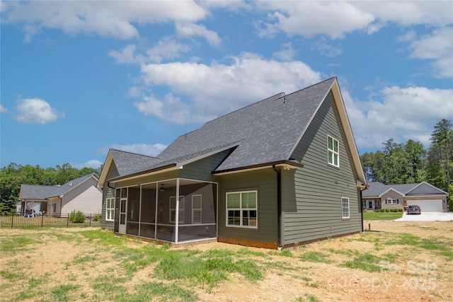 5009 Oconee Dr, Stanley, NC 28164 - rear view of house with a sunroom and a shingled roof