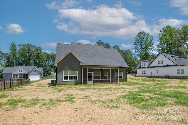 5009 Oconee Dr, Stanley, NC 28164 - rear view of house with a sunroom and a shingled roof