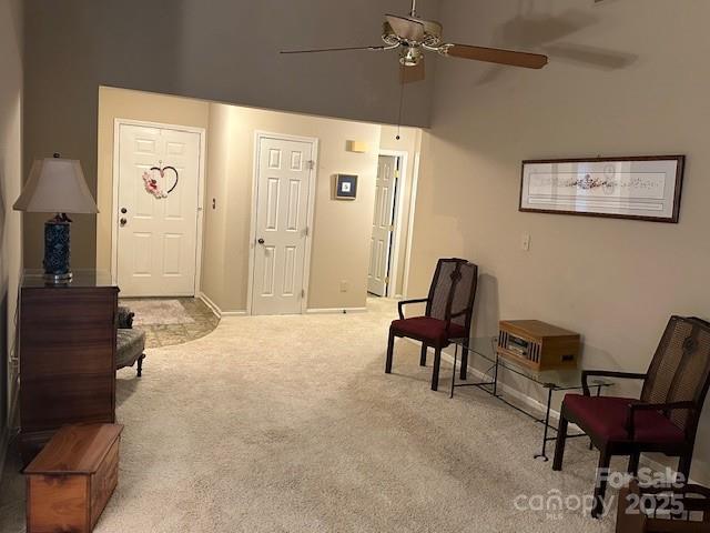 1678 Robins Nest Ct Unit B, Gastonia, NC 28054 - living area featuring a ceiling fan, carpet flooring, and high vaulted ceiling
