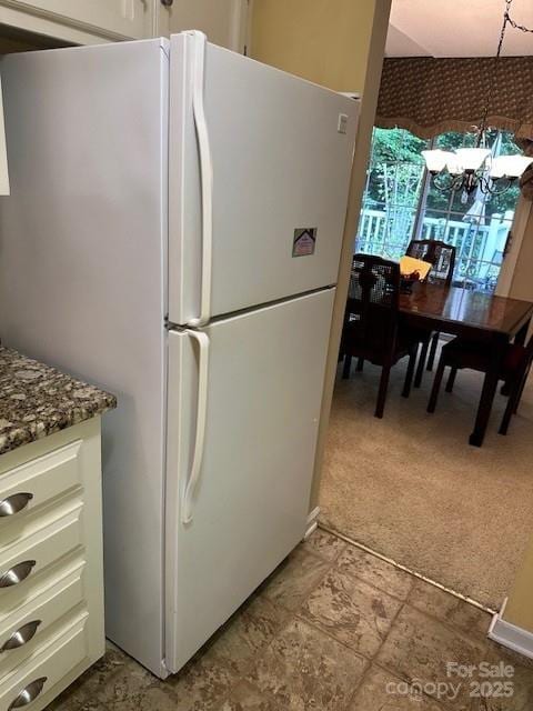 1678 Robins Nest Ct Unit B, Gastonia, NC 28054 - kitchen featuring freestanding refrigerator, white cabinets, and dark stone countertops
