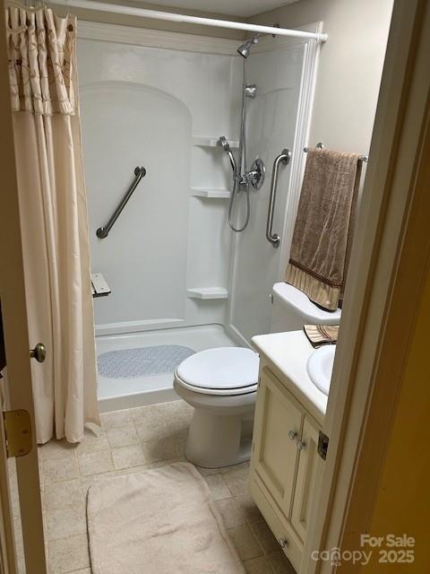 1678 Robins Nest Ct Unit B, Gastonia, NC 28054 - bathroom with a shower stall, vanity, and tile patterned flooring