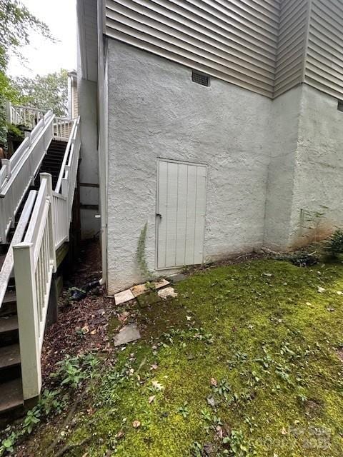 1678 Robins Nest Ct Unit B, Gastonia, NC 28054 - view of home's exterior with stairs and stucco siding