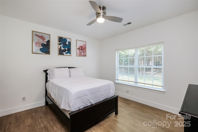2002 Ledare Ln Unit 70, Indian Trail, NC 28079 - bedroom with wood finished floors and a ceiling fan