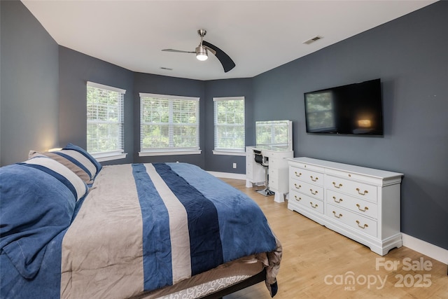 2002 Ledare Ln Unit 70, Indian Trail, NC 28079 - bedroom featuring light wood-style floors and a ceiling fan