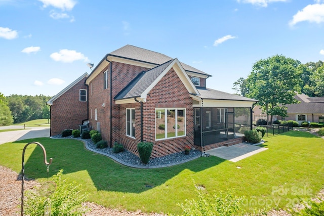 120 Cheyenne Ln, Statesville, NC 28677 - back of property with a sunroom and brick siding