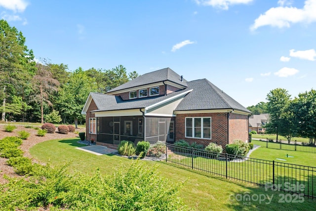 120 Cheyenne Ln, Statesville, NC 28677 - rear view of property with a sunroom, brick siding, and a shingled roof