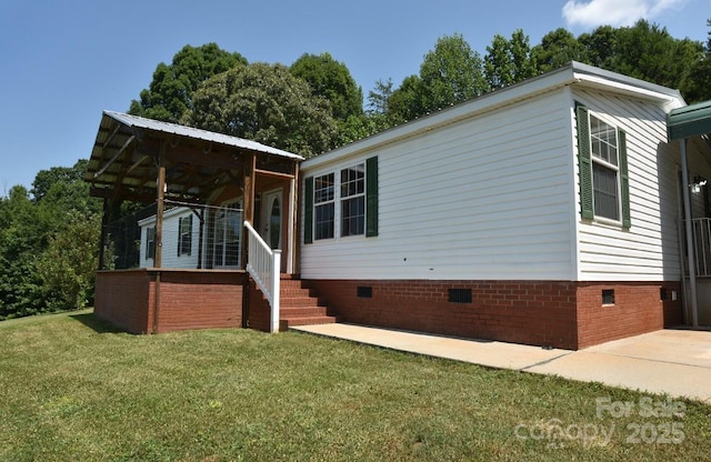 1924 Junction Rd, Mocksville, NC 27028 - view of front of home with crawl space and a front yard