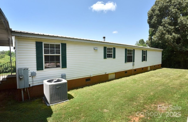 1924 Junction Rd, Mocksville, NC 27028 - rear view of property featuring crawl space, a yard, and a metal roof