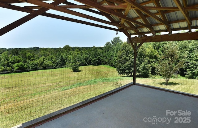 1924 Junction Rd, Mocksville, NC 27028 - view of green lawn with a wooded view and a patio area