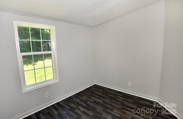 1924 Junction Rd, Mocksville, NC 27028 - empty room with dark wood-style floors, a textured ceiling, and crown molding