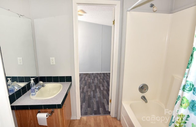 1924 Junction Rd, Mocksville, NC 27028 - bathroom featuring vanity, shower / bath combination with curtain, and wood finished floors