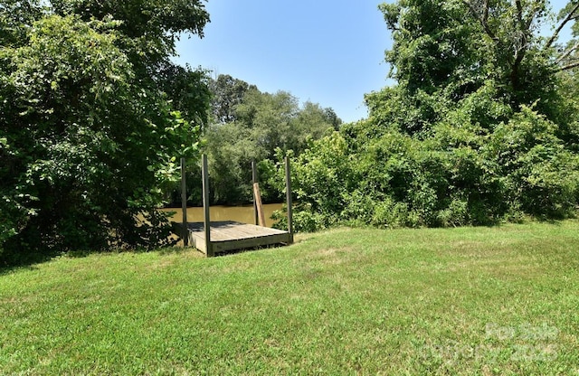 1924 Junction Rd, Mocksville, NC 27028 - view of green lawn with a deck