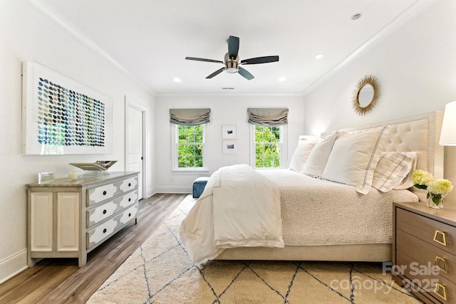 1614 Lombardy Cir, Charlotte, NC 28203 - bedroom with crown molding, light wood finished floors, and a ceiling fan