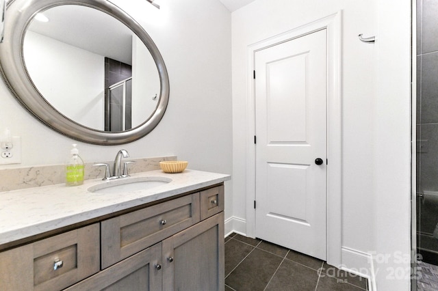 1614 Lombardy Cir, Charlotte, NC 28203 - full bathroom with vanity, tile patterned flooring, and an enclosed shower