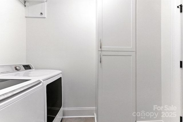 1614 Lombardy Cir, Charlotte, NC 28203 - laundry room featuring washing machine and clothes dryer and cabinet space