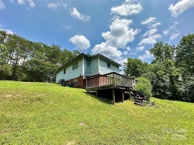 4207 Peach Orchard Rd, Granite Falls, NC 28630 - view of home's exterior with a deck and a yard