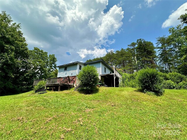4207 Peach Orchard Rd, Granite Falls, NC 28630 - view of grassy yard with a wooden deck