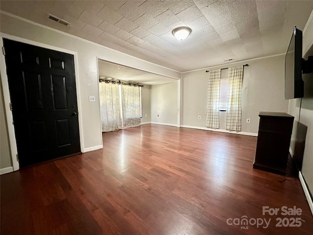 4207 Peach Orchard Rd, Granite Falls, NC 28630 - spare room with crown molding and wood finished floors