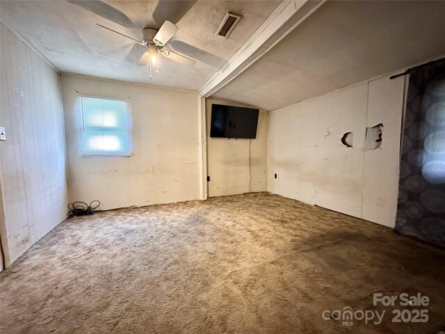 4207 Peach Orchard Rd, Granite Falls, NC 28630 - carpeted empty room with ceiling fan