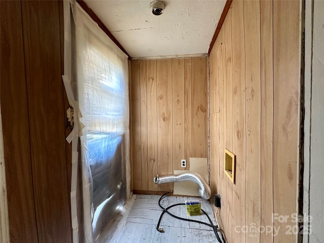 4207 Peach Orchard Rd, Granite Falls, NC 28630 - laundry room with wood walls and wood finished floors